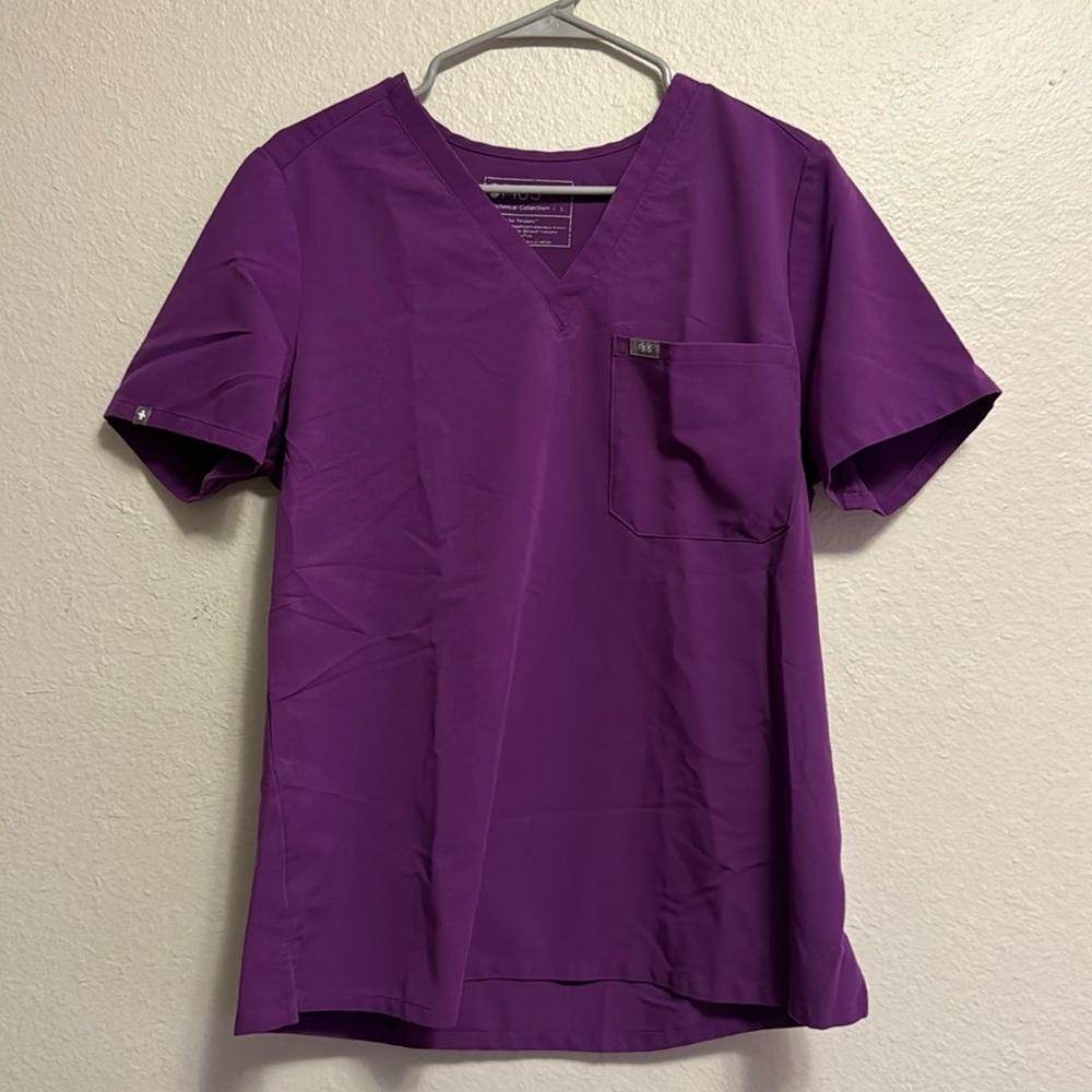 Figs Catarina One-pocket scrub top in Magic purple.